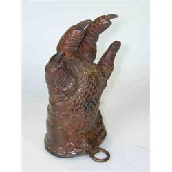 J McEwan, a preserved crocodile's foot, 16cm long  £30-50...