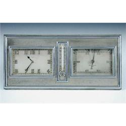 A Negretti & Zambra Art Deco chrome and silver plated desk timepiece and barometer, the central chr.