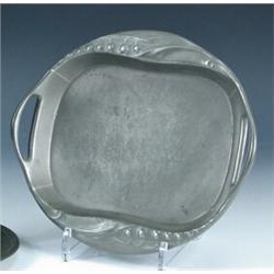 An early 20th century Kayserzinn pewter tray, the oval end pierced with handles and the sides cast..