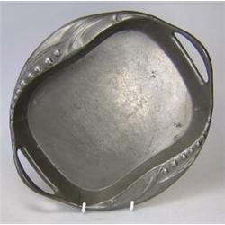 An early 20th century Kayserzinn tray, two handles raised above the rim at each end of the oval out.