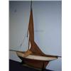 Image 1 : An early 20th century pond yacht, boarded decks above the white hull and lead weighted keel, the ma.