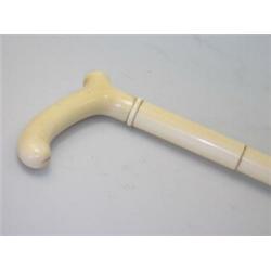 A late 19th century lady's ivory walking cane cut in sections to imitate bamboo in its length, the..