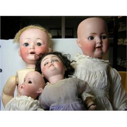 Four early 20th century bisque headed dolls, to include: a number 5 doll, 53cm tall, a Porzellanfab.