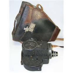 An Ensign Super Kinecam 16mm cine camera, with leather case  £40-60...