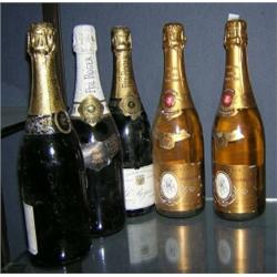 Champagne.  Louis Roederer Cristal 1982, 2 bottles; Pol Roger Extra Dry 1982, 2 bottles, and one ot.