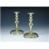 Image 1 : A pair of early George III brass petal base candlesticks, the shaped square feet and column knops w.
