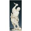 Image 1 : An early 20th century Japanese ivory and shark's tooth figure caught in the moment of raising a kni.