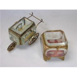 Two late 19th century French glass trinket boxes, one mounted in gilt metal as a wheel barrow, 8.5c.