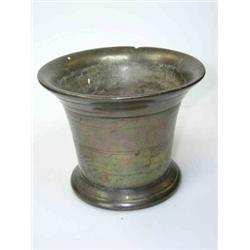 An 18th century bronze mortar with reed turned flared sides and foot, 13.5cm diameter  £50-70...