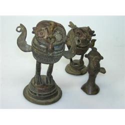 A graded set of three Ashanti type bronze birds, each of owl form the largest with stylised mouse i.