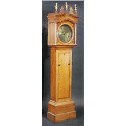 Bagnall, Dudley. A George III oak longcase clock, the hood with broken pediment, three gilt urn fin.