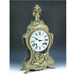 Vandesteen à Mons.  An 18th century French bracket clock, the waisted green stained and painted she.