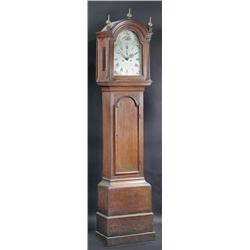 Richd. Reed Chelmsford. An oak longcase clock, the break arch hood with three brass ball finials an.