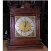 Image 1 : A late Victorian walnut mantle clock, the rectangular case with broken pediment above square brass..