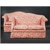 Image 1 : A pair of sofas, each with arched padded back above scrolling padded arms and cushion seat, standin.