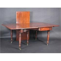 A Regency mahogany concertina action extending dining table, the rounded rectangular top incorporat.