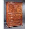 Image 1 : A George III mahogany linen press, the upper section with moulded cornice above a pair of panelled..