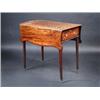 Image 1 : A Regency mahogany butterfly Pembroke table, the shaped line inlaid twin flap top above a deep end..