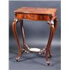 Image 1 : A 19th century mahogany work table, the moulded shaped rising top enclosing a fitted interior above.