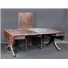 Image 1 : A good Regency mahogany concertina action dining table, the drop flap top with three leaf insertion.
