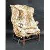Image 1 : An early George III mahogany wing armchair, with worn upholstery, on square legs with H-shape stret.