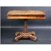 Image 1 : A William IV walnut card table, the moulded rounded rectangular baize lined twin flap top supported.