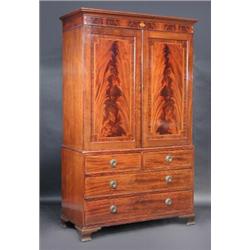 A Regency mahogany linen press, the upper section with moulded cornice above a pair of inlaid panel.