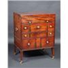 Image 1 : A George III mahogany dressing chest, the square rising top enclosing a fitted interior above a slid
