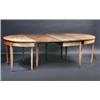 Image 1 : A George III mahogany D-end dining table, the shaped top above a plain frieze supported on square s.