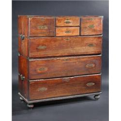 A 19th century padouk two-part campaign chest, the upper section fitted with one long and four shor.