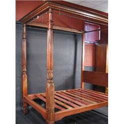 A Victorian mahogany four-poster bed, of typical construction, 210cms wide  £300-500...