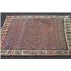 Image 1 : A Khamseh Carpet, 19th century, the allover boteh central design within an ivory border containing..