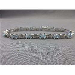 6 CTW Blue Topaz & Diamond Tennis Bracelet