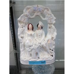 Antique Staffordshire flat-back statuette