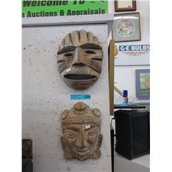 Pair of clay wall masks