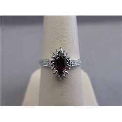 .70 CT Marquis-Cut Garnet Ring set with 2 Diamonds