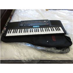 Used Casio keyboard and 2 new guitar cases