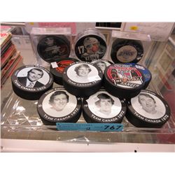 12 Hockey pucks - 3 Autographed