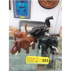 4 Carved elephants