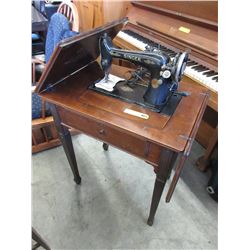 Vintage Singer sewing machine with stand