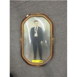 Vintage hand tinted photograph in frame