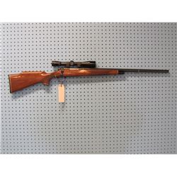 Remington; Model 700; 22-250; Bolt; Floorplate; Bull Barrel; Weaver 6x Scope