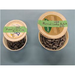 Lot 2 margarine containers muzzel loader bullets