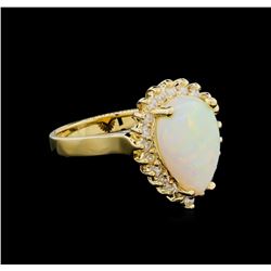 1.00ct Opal and Diamond Ring - 14KT Yellow Gold