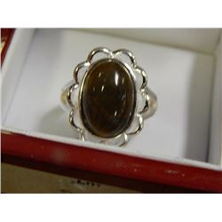RING - STERLING SILVER SET WITH SMOKED QUARTZ SOLIITARE - ESTIMATED VALUE $125