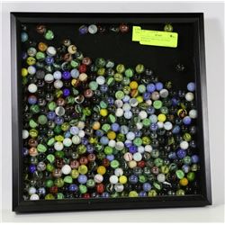 DISPLAY CASE FULL OF 1950'S MARBLES