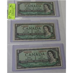 PAGE OF THREE 1954 CANADIAN ONE DOLLAR BANKNOTES