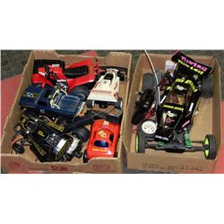 2 BOXES WITH ASSORTED REMOTE CONTROLS CARS