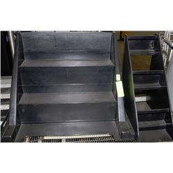 2 SMALL BLACK PLASTIC DISPLAY SHELVES