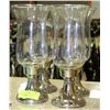 Image 1 : FOUR SILVER PLATED CANDLE HOLDERS